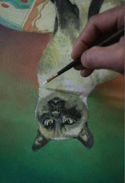 painting upside down, cat