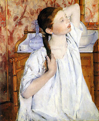 Girl arranging her hair